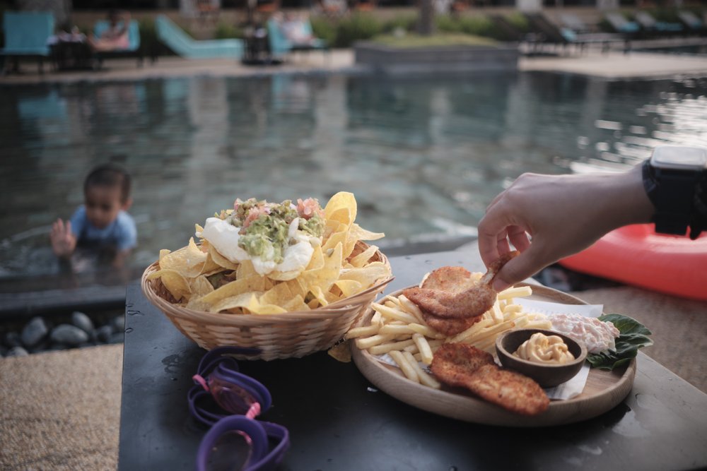  Since Daniel fell asleep in the car ride, we decided to press on to our destination without lunch. Once we arrived, we wasted no time filling up our stomachs by the pool. 
