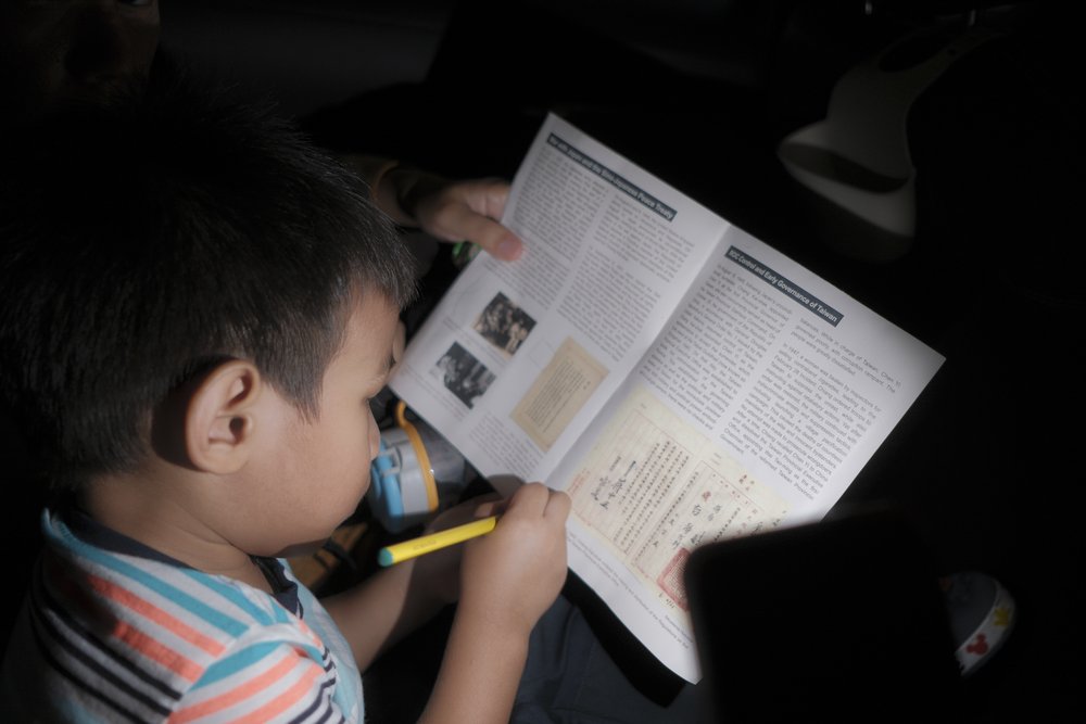  Occupying Daniel with activity books does not stop even if its in the night while we were on the move. 