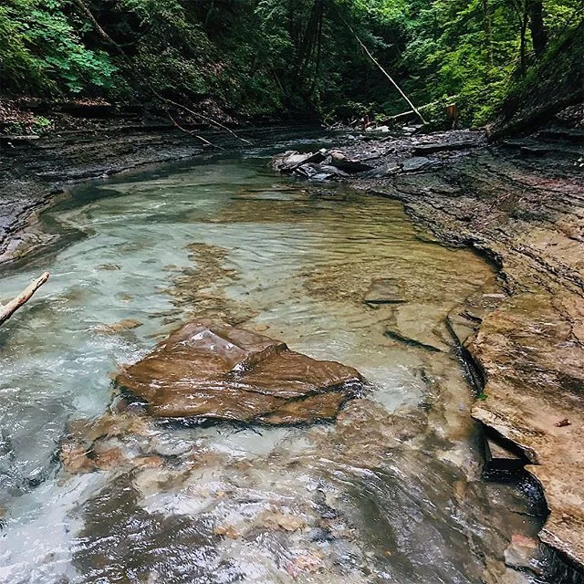 There are places so incredibly beautiful in New York that they don't seem real. This is one of my favorite places I've experienced anywhere - the enchanted Grimes Glen located in Naples, NY. Waterfalls, pristinely clean and clear water, gorgeous shal