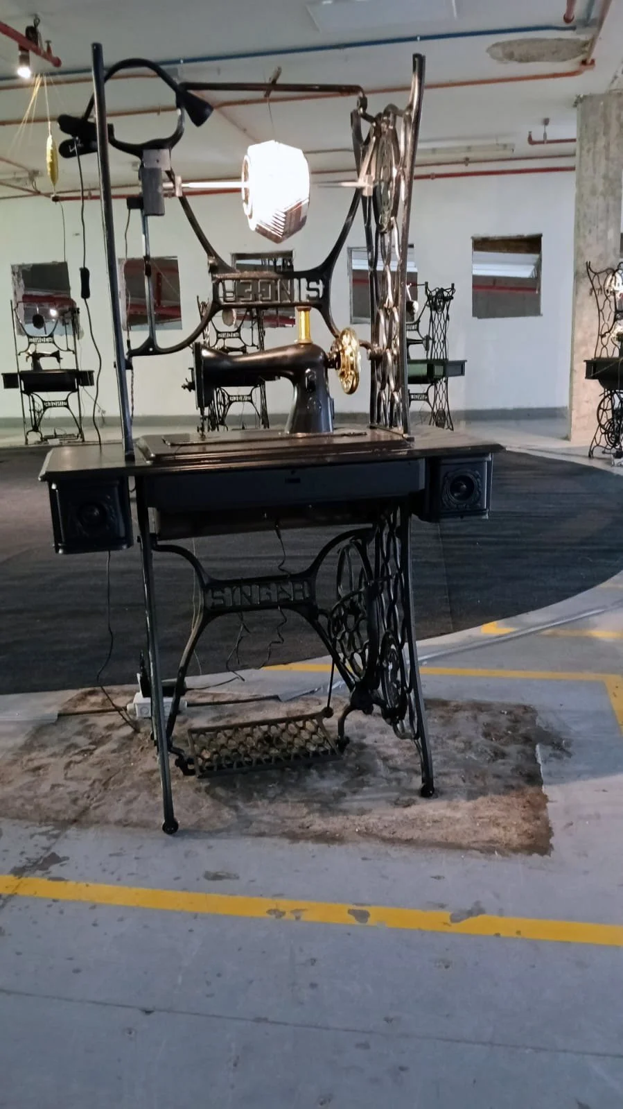 Hilo Vano · Machine frame, suspended animation disc, pedal and sound components. BIAM, Antiguo Edificio Coltabaco, Medellín, 5 October 2025.