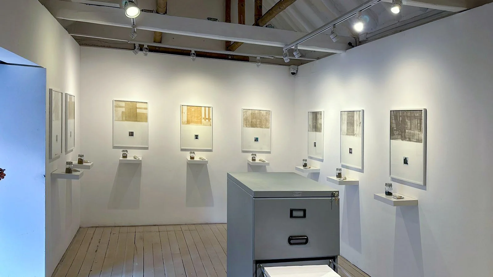 Mordiendo Polvo · Spatial overview of the filing cabinet installation · VII Biennial of Visual and Plastic Arts, FUGA · Bogotá, Colombia, 2024