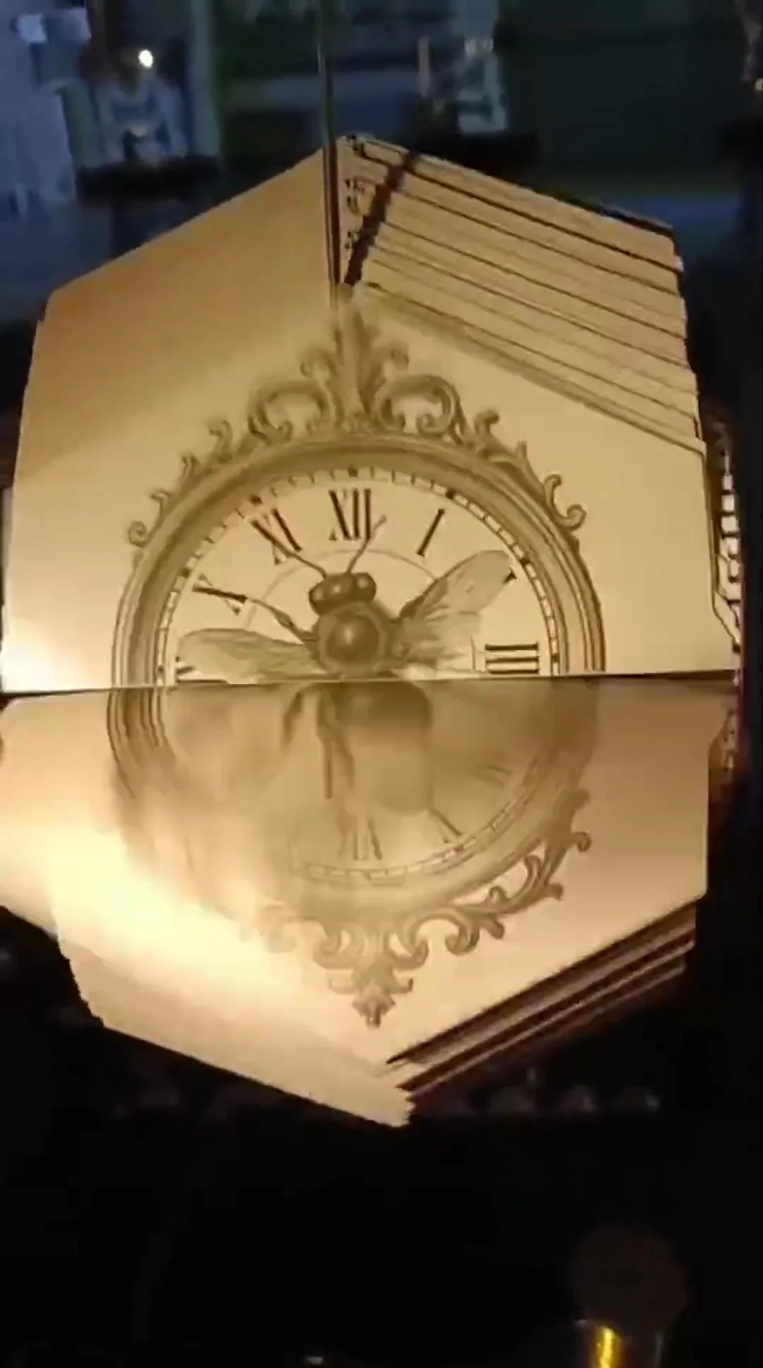 Hilo Vano · Bee / clock animation. BIAM, Medellín, 2025. Video still from the original installation walkthrough, 02:10.