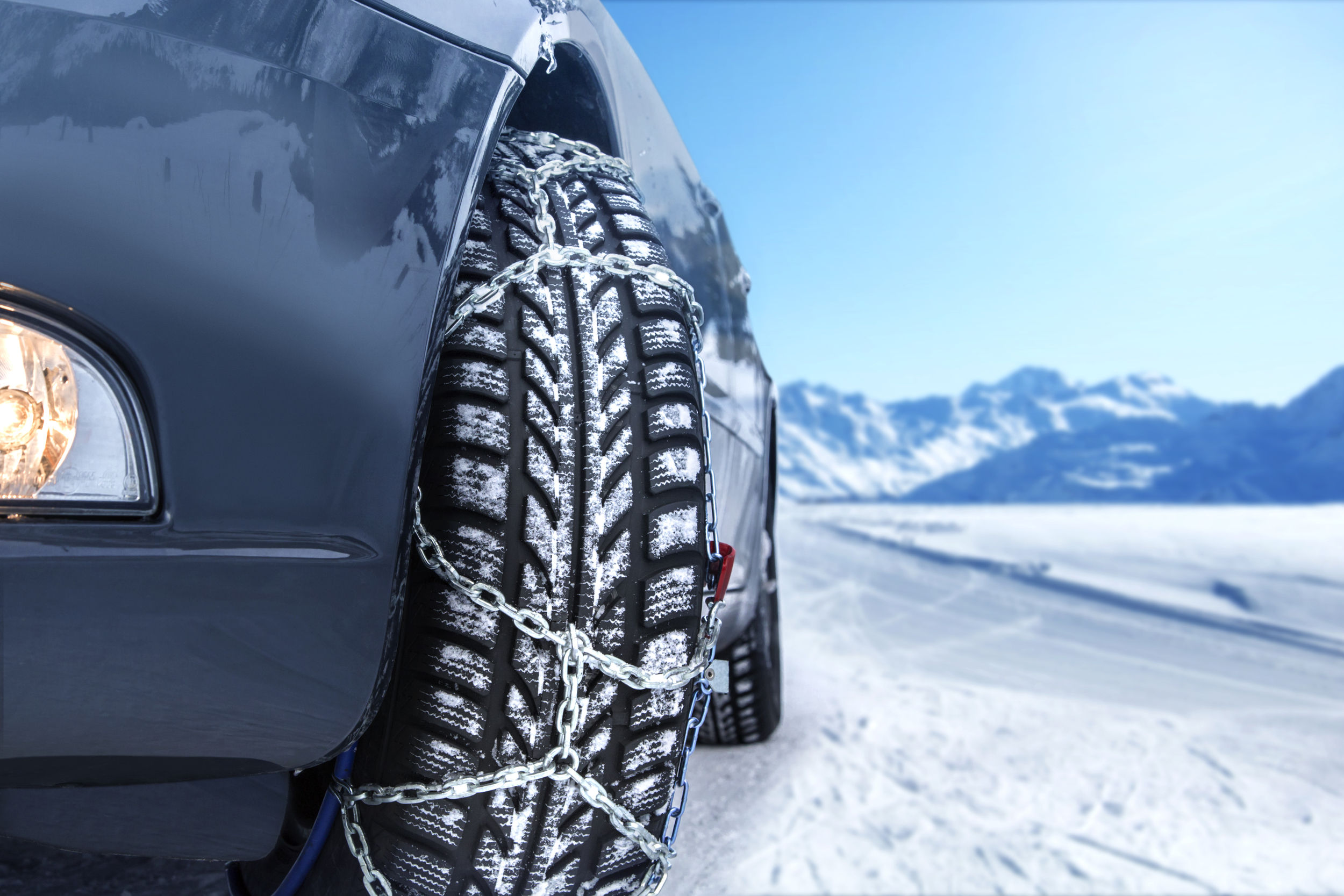 Blue car with chains.jpg