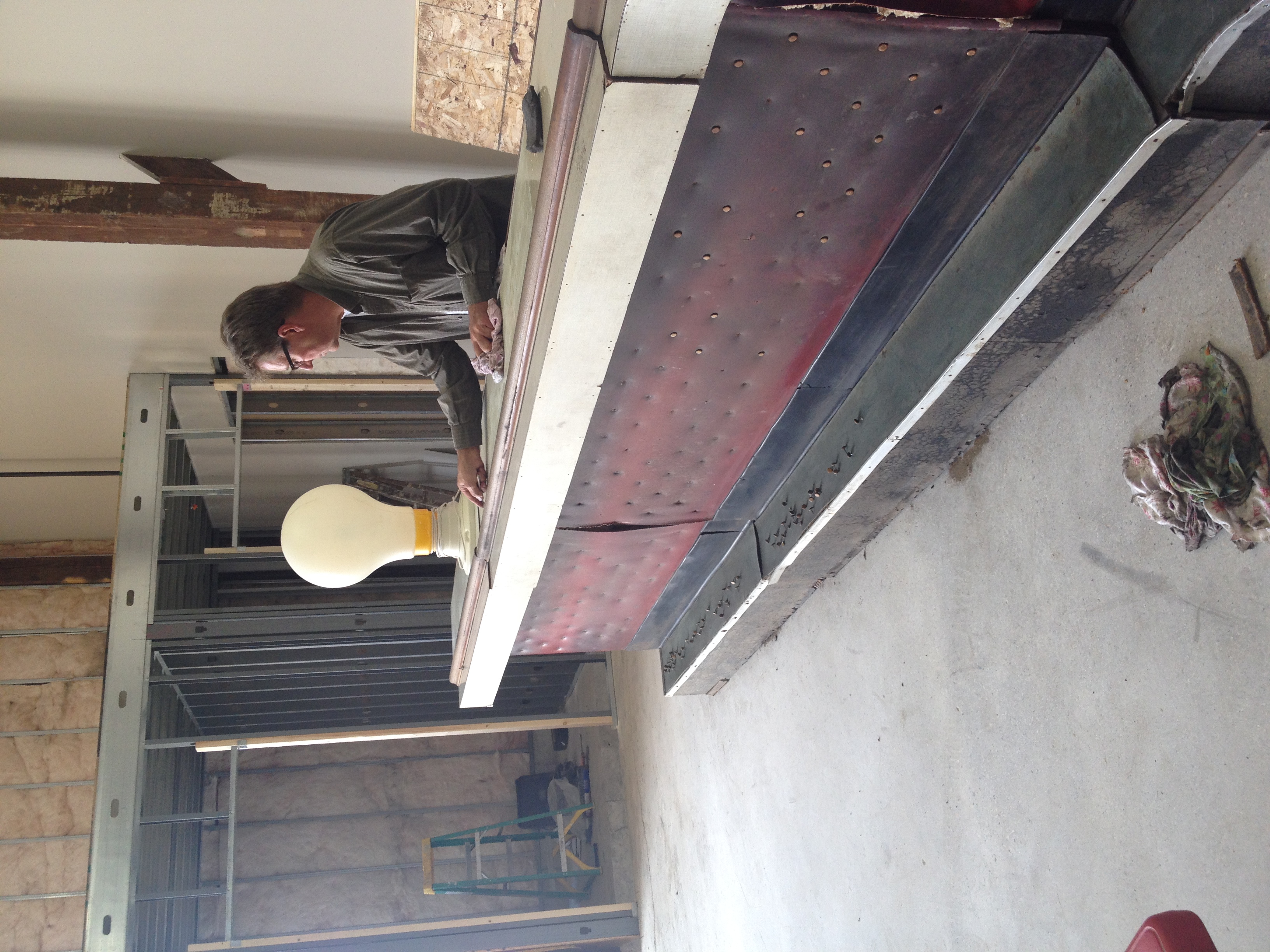 My dad, Clayton, starting the repair work and cleaning of the Vintage Bar . 