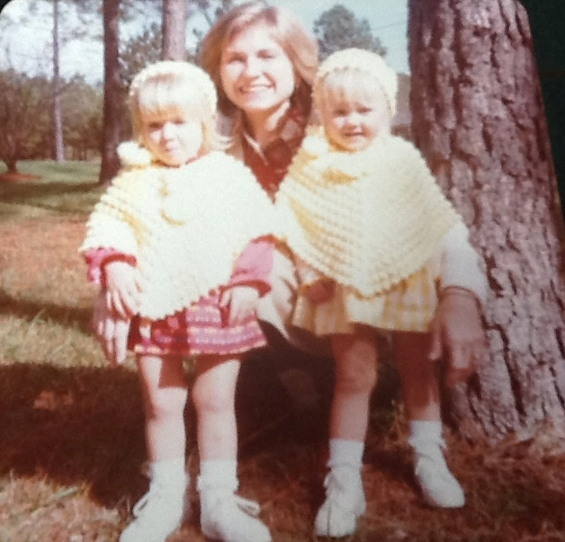 My twin sister, Natalie, my mom and me circa 1979. Fashionistas wearing ponchos and hats. We were two years old -Circa 1978.