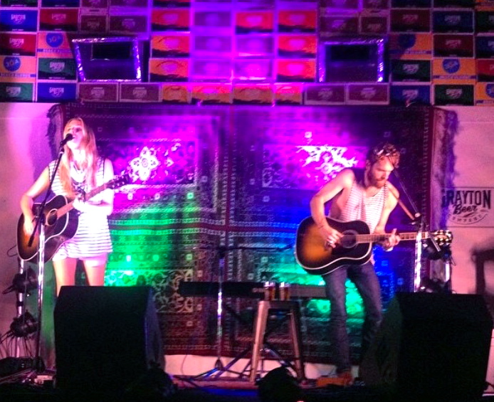 Holly Williams (Hank Williams, Jr. Daughter) on stage jamming with her husband Chris Coleman, of Kings of Leon. 
