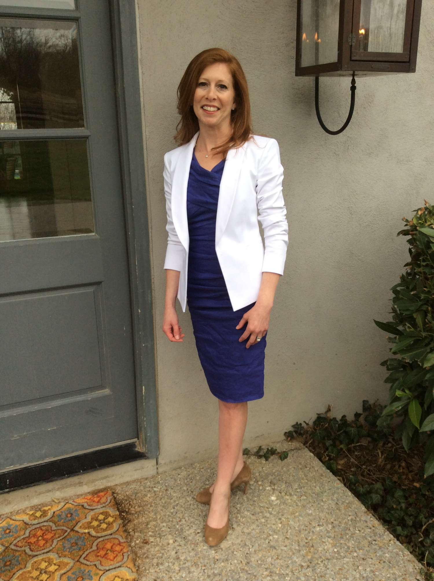 Jan B. wearing a Nicole Miller dress (from Kiki Risa in Destin, FL) , Theory white blazer (from Saks Off 5th) and her own heels. Very professional! 