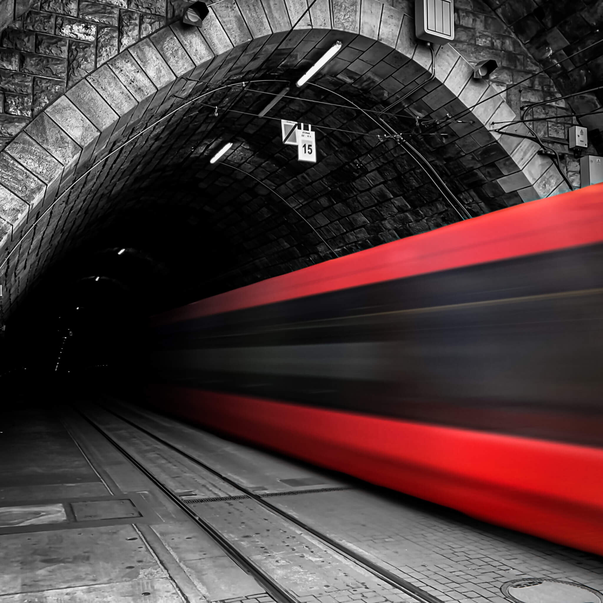 Long Exposure of a tram entering the tunnel