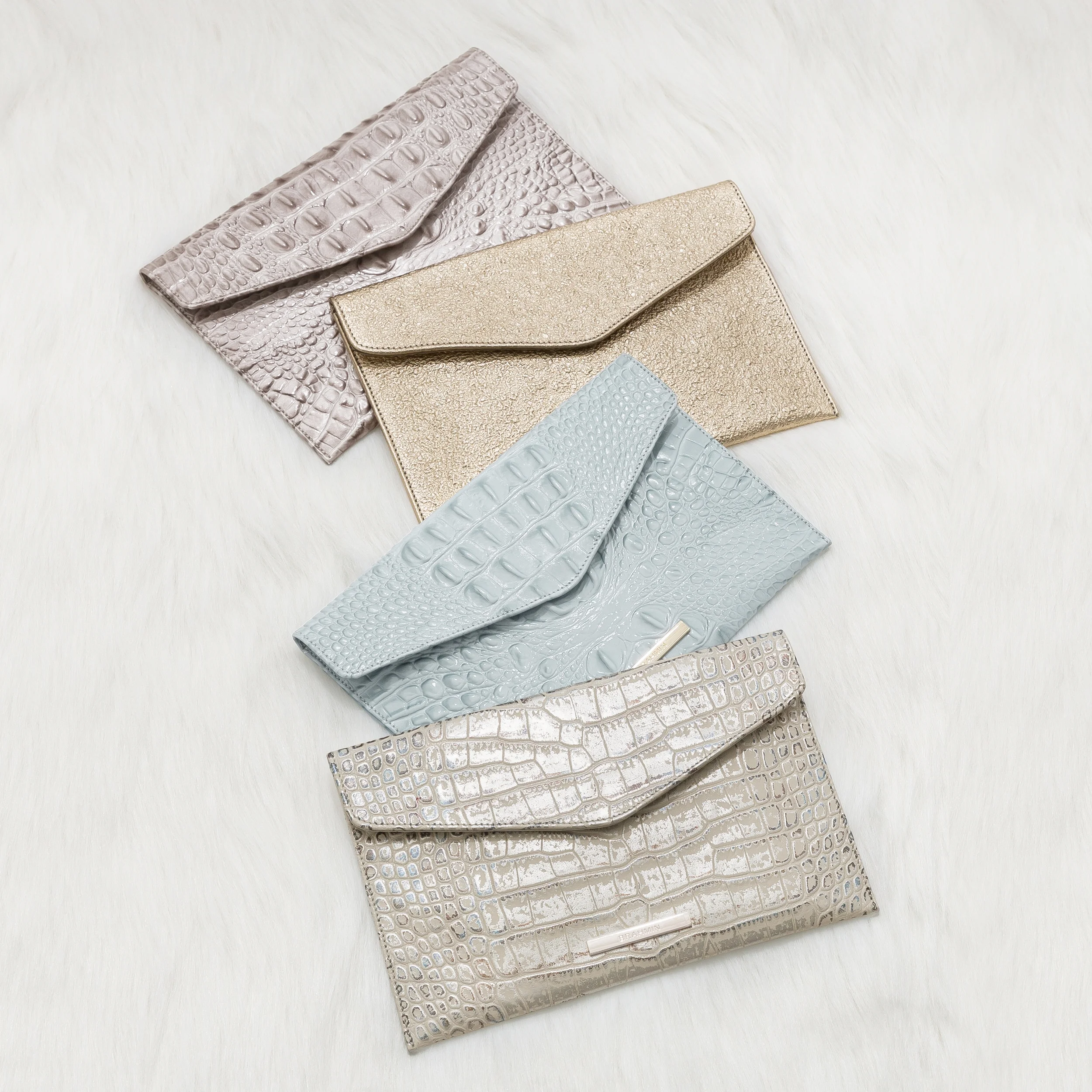 HOLIDAY-ENVELOPE-CLUTCHES-GROUP-SHOT_RGB.jpg