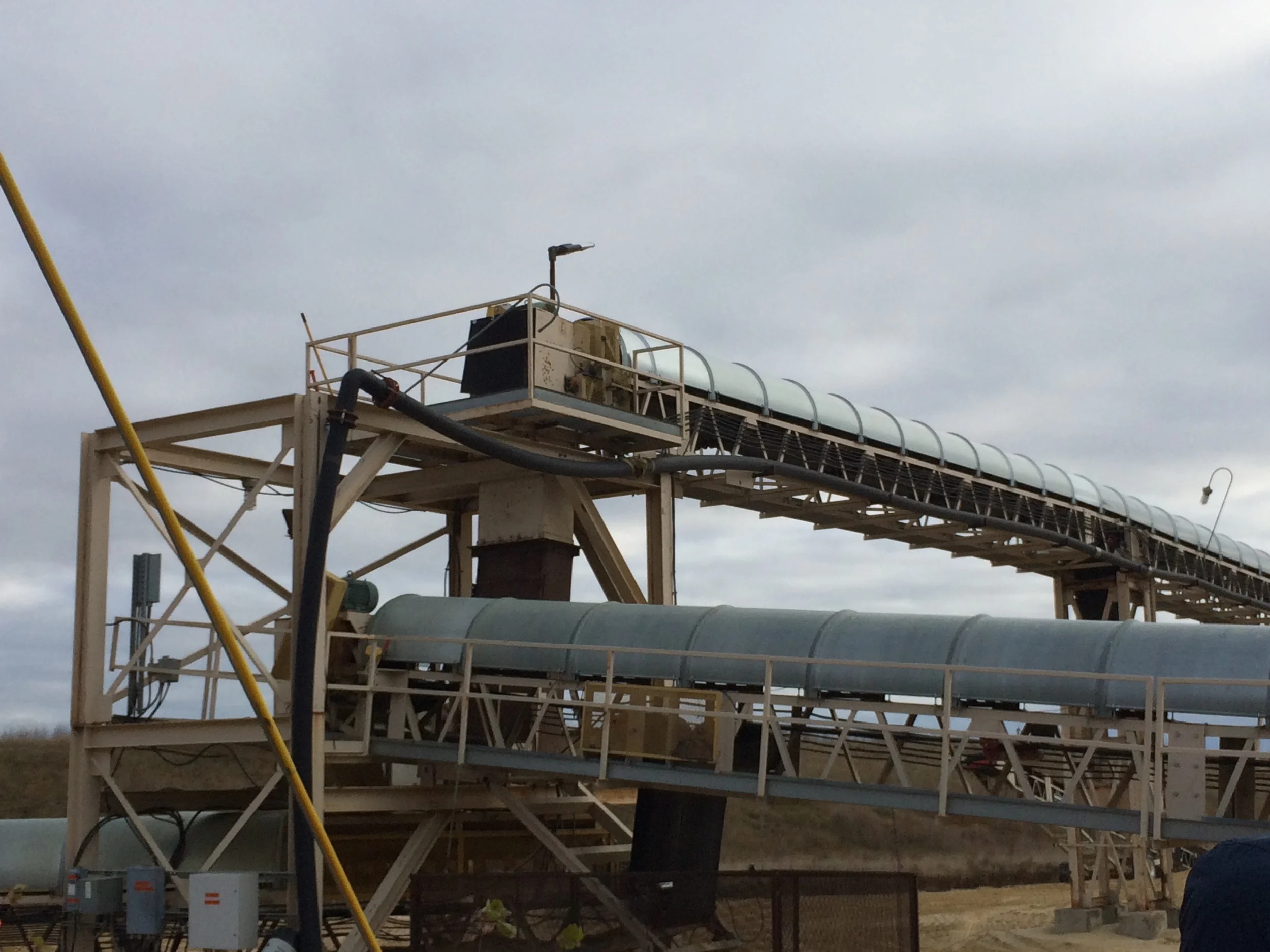These chutes take the sand from one part of the mine to another. It's hard to tell from the pictures, but their piles of sand are gigantic.
