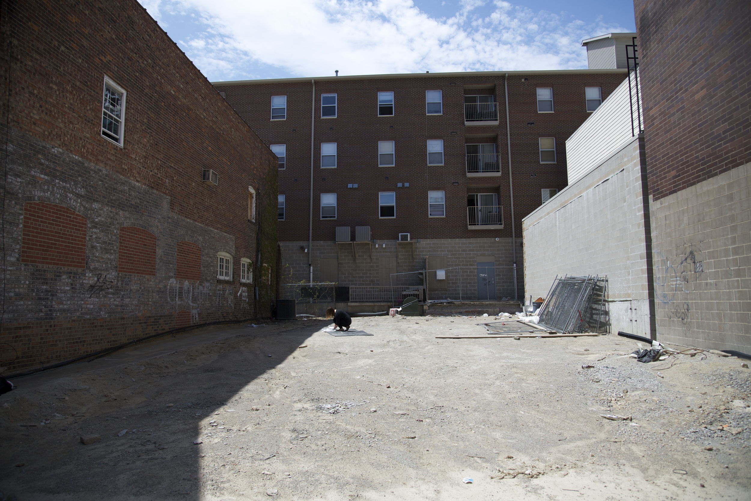 'Residue' documents a durational performance that took place in the vacant lot where my home once stood. I made rubbings on handmade paper and after 16 hours compiled a grave rubbing of the entire footprint of the house. These rubbings recor