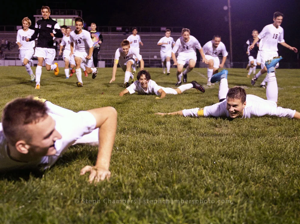 Greensburg Central Catholic's Brad Caric looks back to Riley Slike, right, during a victory slide after beating Serra Catholic on Thursday, Oct. 8, 2015 at Greensburg Central Catholic. GCC won 3-0.