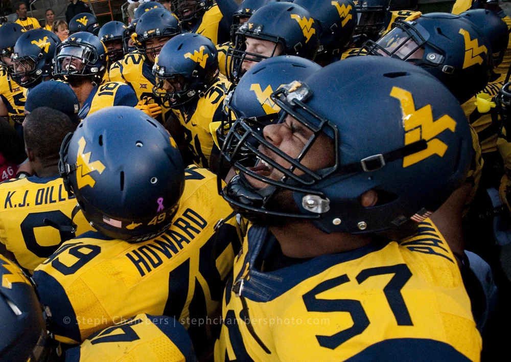 West Virginia offensive lineman Adam Pankey (57) amps up with his team before playing Oklahoma State on Saturday, Oct. 10, 2015 at Milan Puskar Stadium in Morgantown, W.Va. Oklahoma State won 33-26 in overtime.