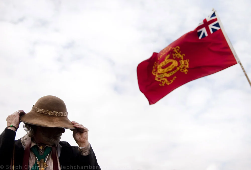 Dave Leiendecker of Plum, impersonating a member of Proctor's Militia, adjusts his hat in the wind during Fall Family Day at Historic Hanna’s Townon Saturday, Oct. 17, 2015. The event continues Sunday.