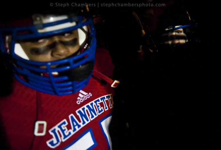 Jeannette's Jimmy Malik, right, prepares to take the field against Chartiers-Houston during a WPIAL football game on Friday, Nov. 6, 2015 at Jeannette's McKee Stadium.