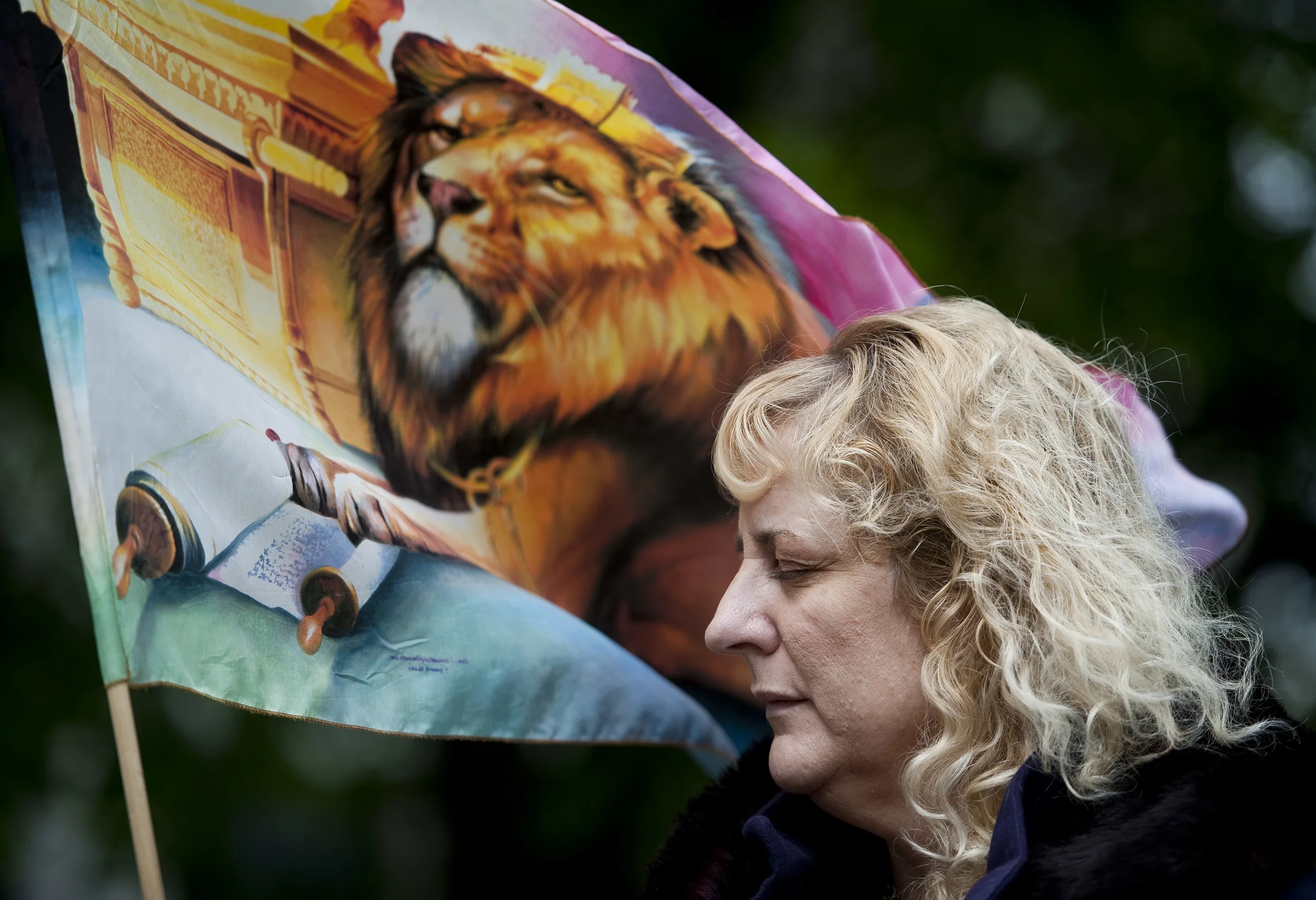 Teresa Masarik of Greensburg prays during the National Day of Prayer in front of the Westmoreland County Courthouse in Greensburg on Wednesday, May 5, 2016.