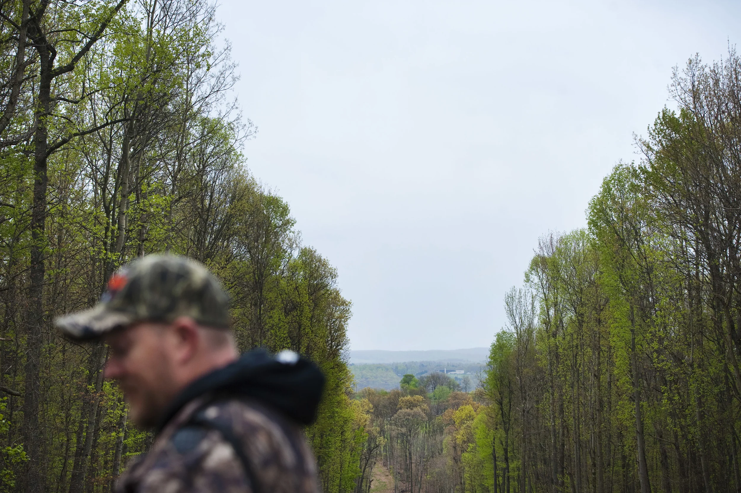 BAPS Bigfoot and Paranormal Society co-founder Shawn Dennis pauses at the top of a pipeline tree clearing during the 2016 Pennsylvania Bigfoot Camping Adventure at Benner's Meadow Run campground near Farmington on Friday, May 6. Experts say Bigfeet prefer hilly, wooded areas and pipeline clearings make their habitats easily accessible. The Farmington area has been known as a Bigfoot hotbed with numerous encounters reported by campers, hunters and locals.