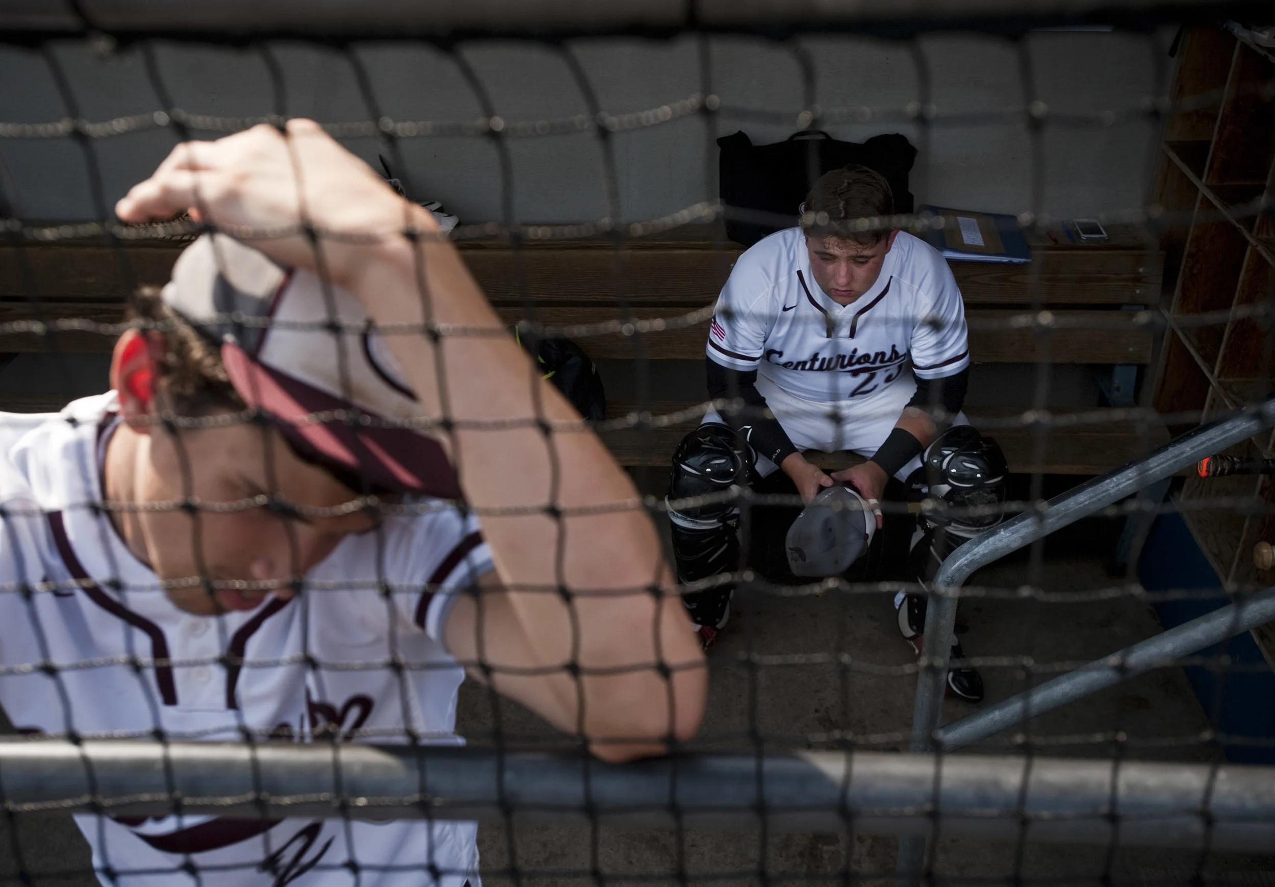 Greensburg Central Catholic’s Zack Skatell rests in the dugout before playing Serra Catholic in the WPIAL Class A championship game on Wednesday, June, 2016, at Consol Energy Park in Washington. Serra Catholic won 6-3.