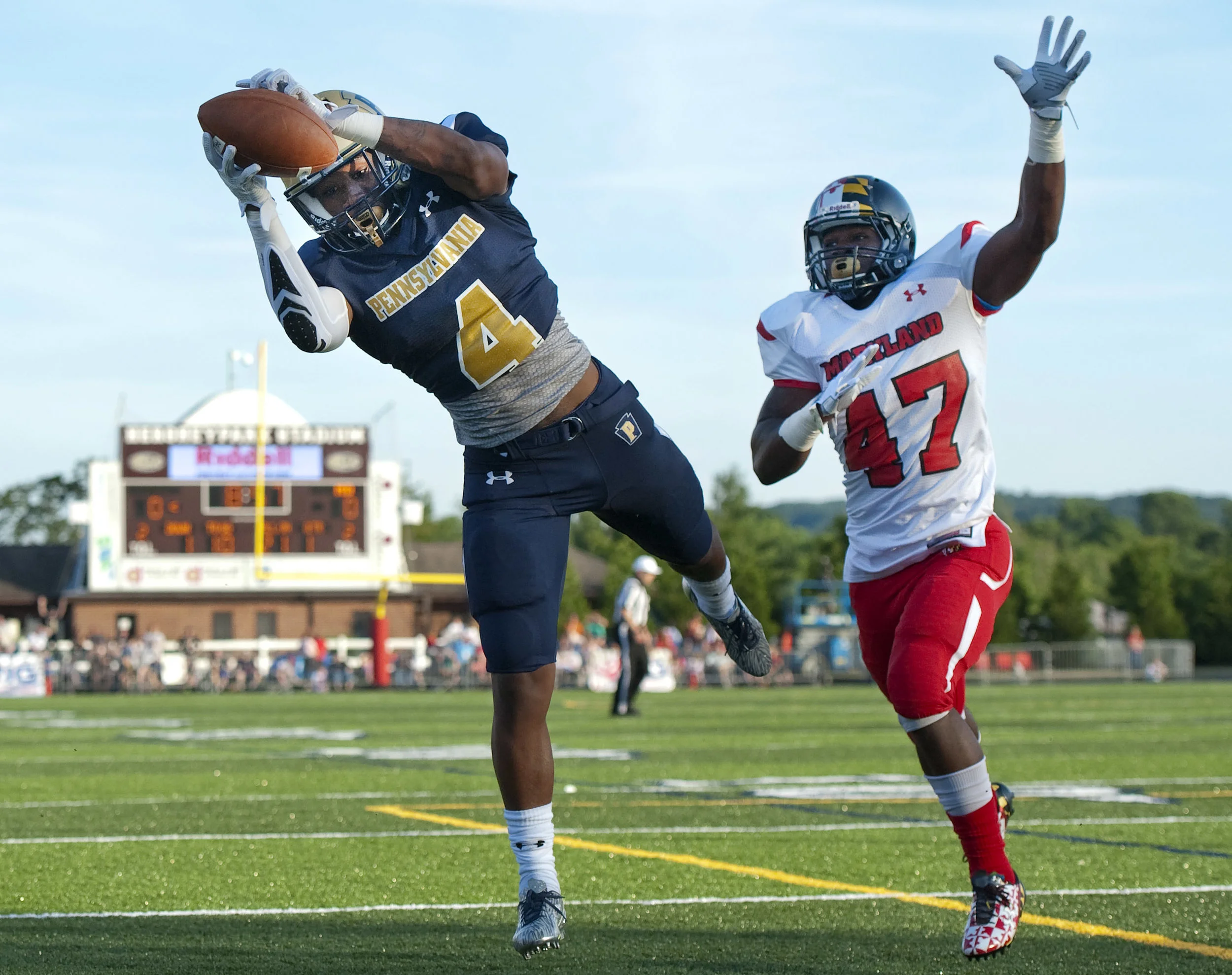 Pennsylvania’s Miles Sanders (Woodland Hills, Penn State) makes a leaping catch for a touchdown in front of Maryland’s Jordan Hill (Paint Branch, Harvard) during the Big 33 Football Classic between Pennsylvania and Maryland on Saturday, June 18, 2016 at Hersheypark Stadium. Pennsylvania won 26-14.