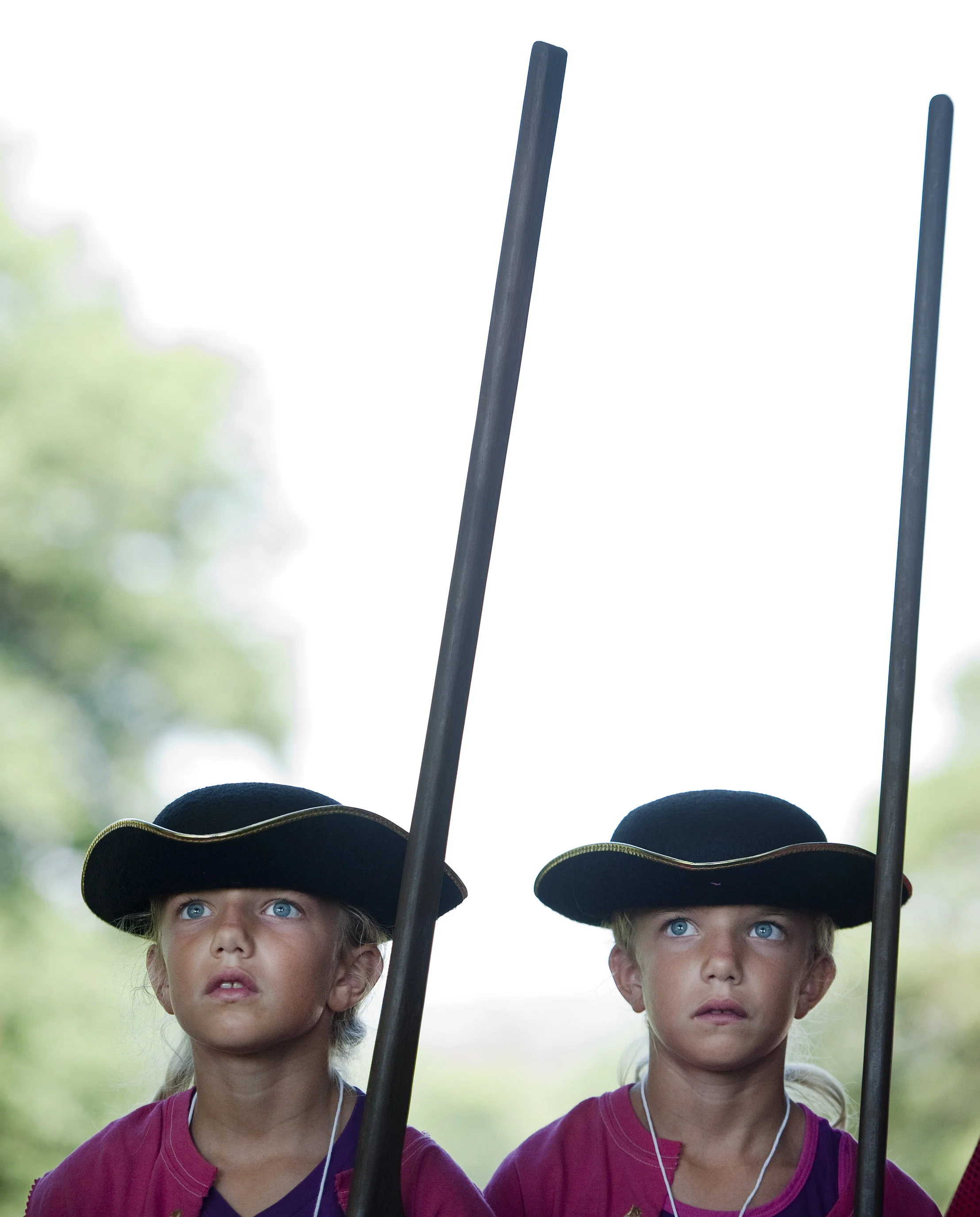 Olivia Weishaar (left) stands at attention with her twin sister Hanna, both 8 of Harrison City, while taking commands from Brian Harris, reenacting a private of Ourry's 60th Royal American Regime, during Living History Day Camp at Bushy Run Battlefi…