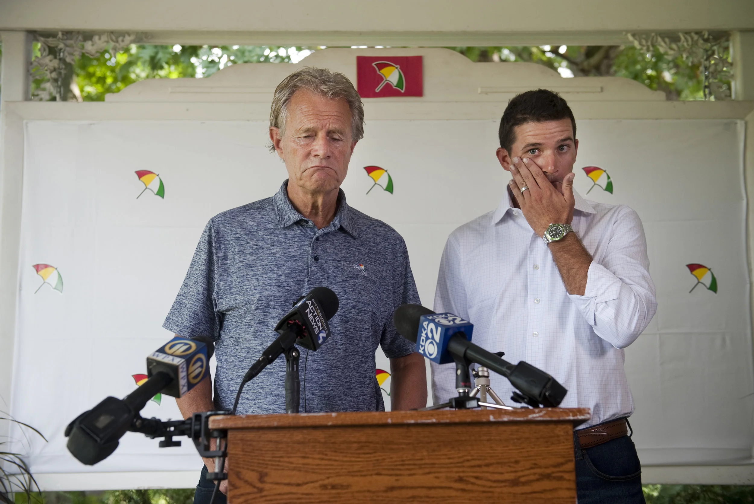 Chairman of Arnold Palmer Enterprises Alastair Johnston and Arnold Palmer's grandson Sam Saunders react during a press conference at Latrobe Country Club on Monday, Sept. 26, 2016. Arnold Palmer, 87, died Sunday night.
