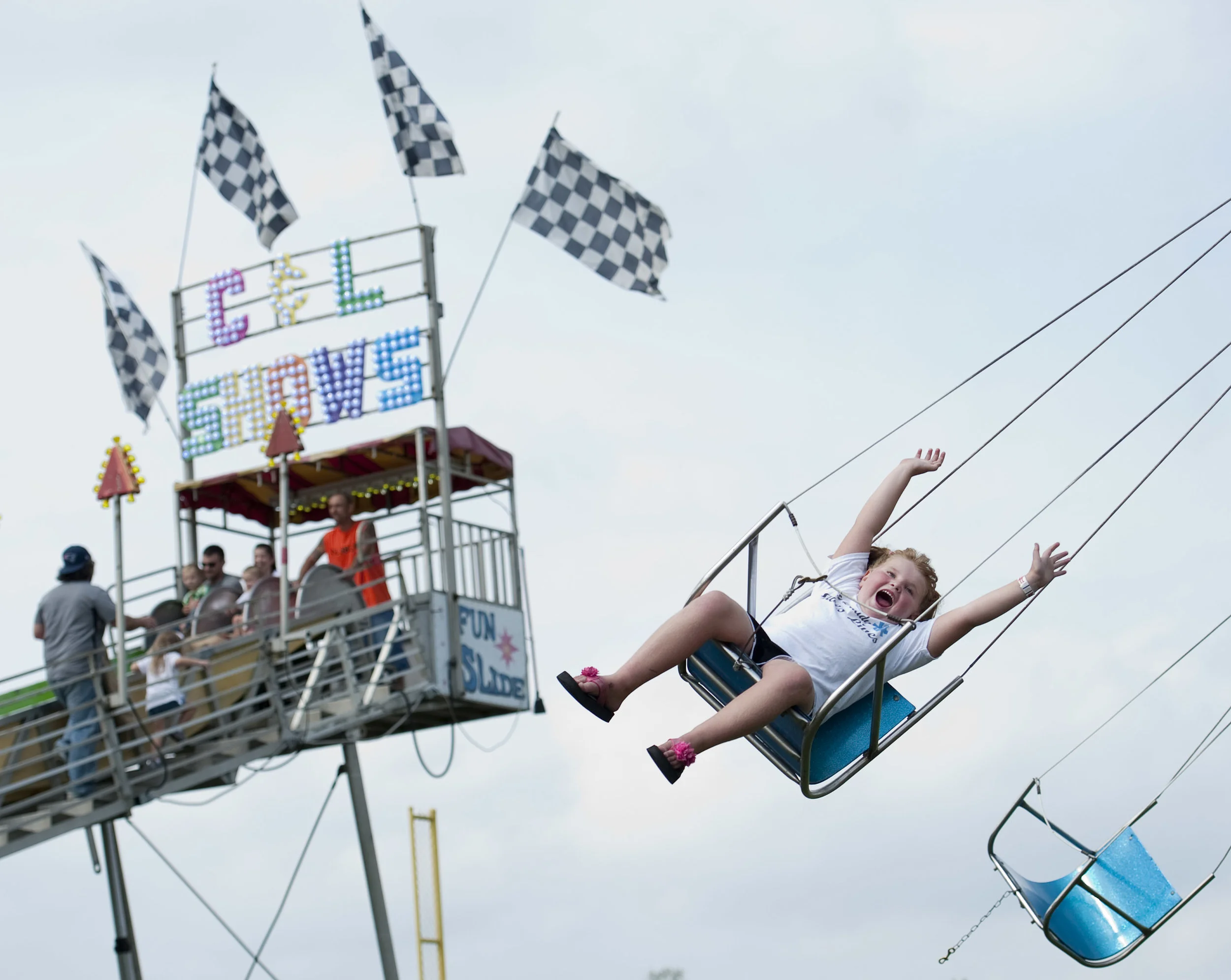 Lydia Grant, 6 of Penn Township, rides a swing during the Penn Township Fall Festival on Saturday, Sept. 17, 2016 at the Penn Township Municipal Park in Harrison City. The second phase of the $500,000 improvements to the 63-acre park was the highlig…