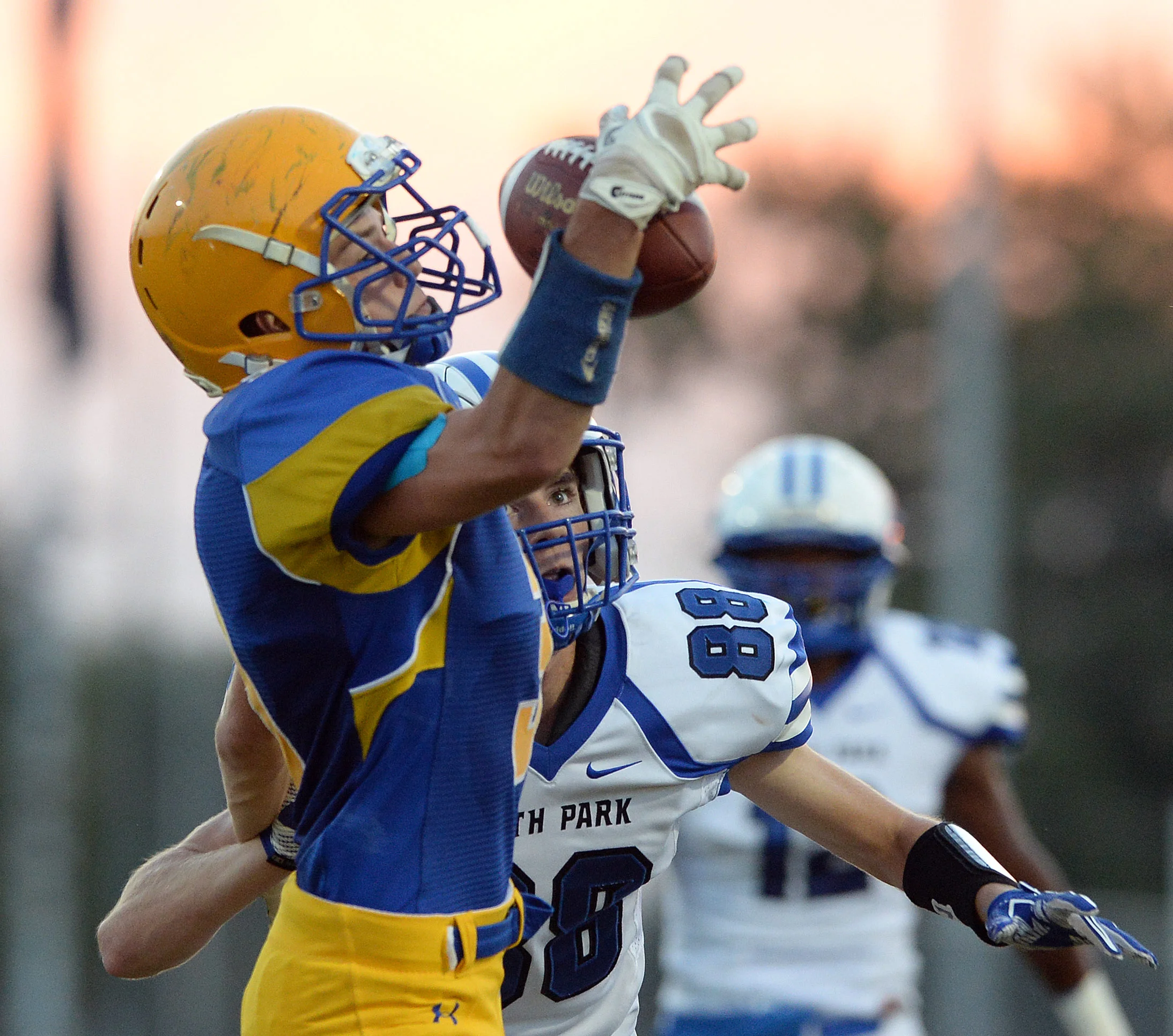Derry’s Kerek Hoffman attempts to catch a one-handed pass in front of South Park’s Aaron Walker on Friday, Sept. 23, 2016 during a football game at Derry Area High School.
