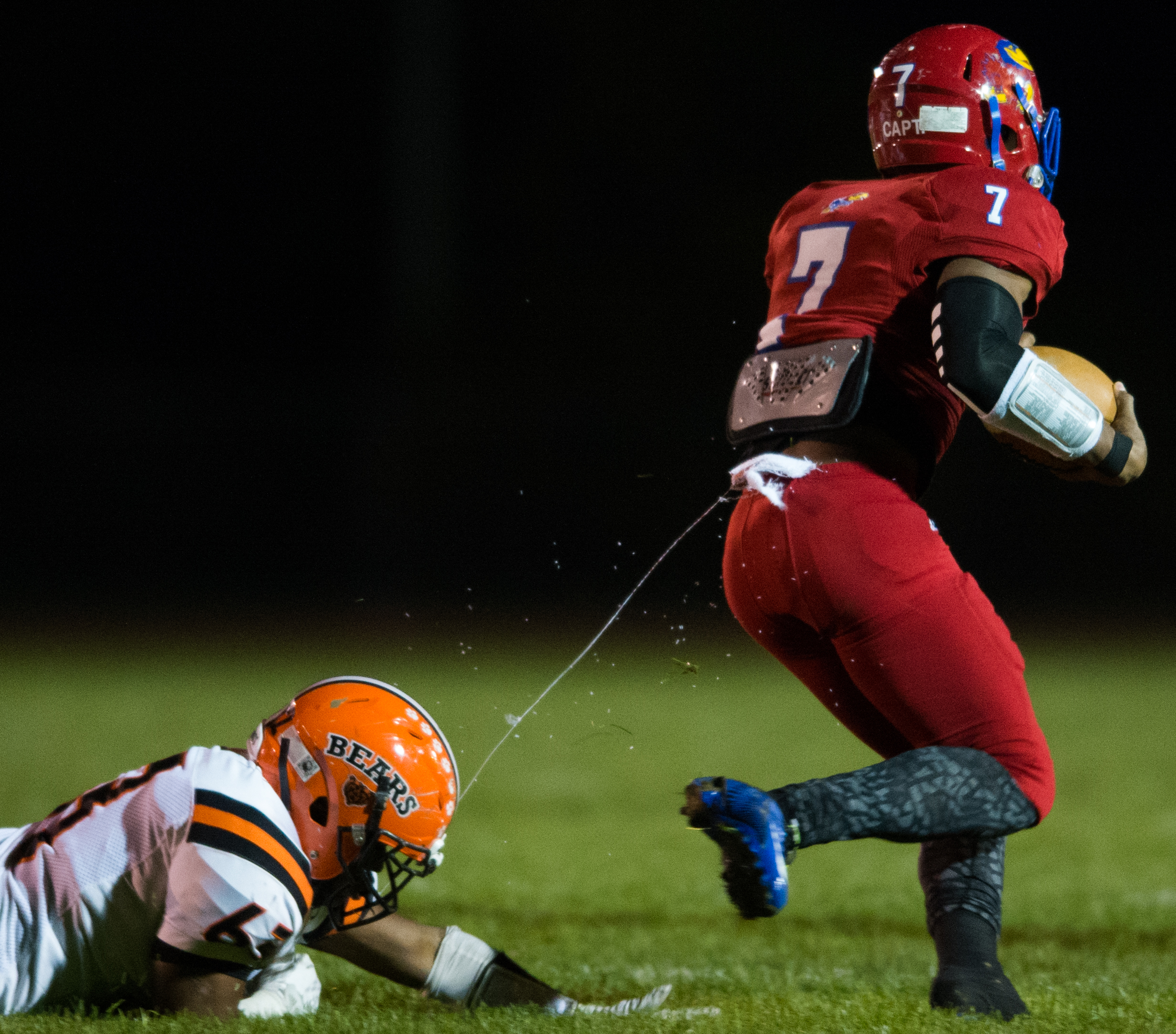  Clairton's Daiqwaan Lovett hangs onto a string of Jeannette’s Kareem Hall on Friday, Oct. 28, 2016 at Jeannette's McKee Stadium. Clairton beat Jeannette 32-13. 