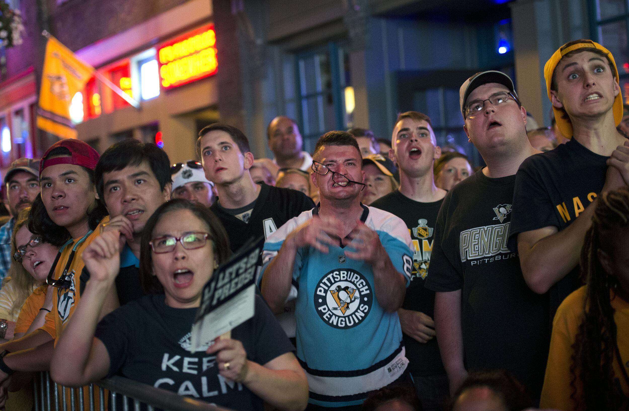 Eyeglasses fly off the face of Matt Jenkins Castro from Pittsburgh as he reacts to a scoring opportunity against the Nashville Predators during a screening of game 3 of the Stanley Cup Final on Saturday, June 3, 2017 along Broadway in Nashville.  