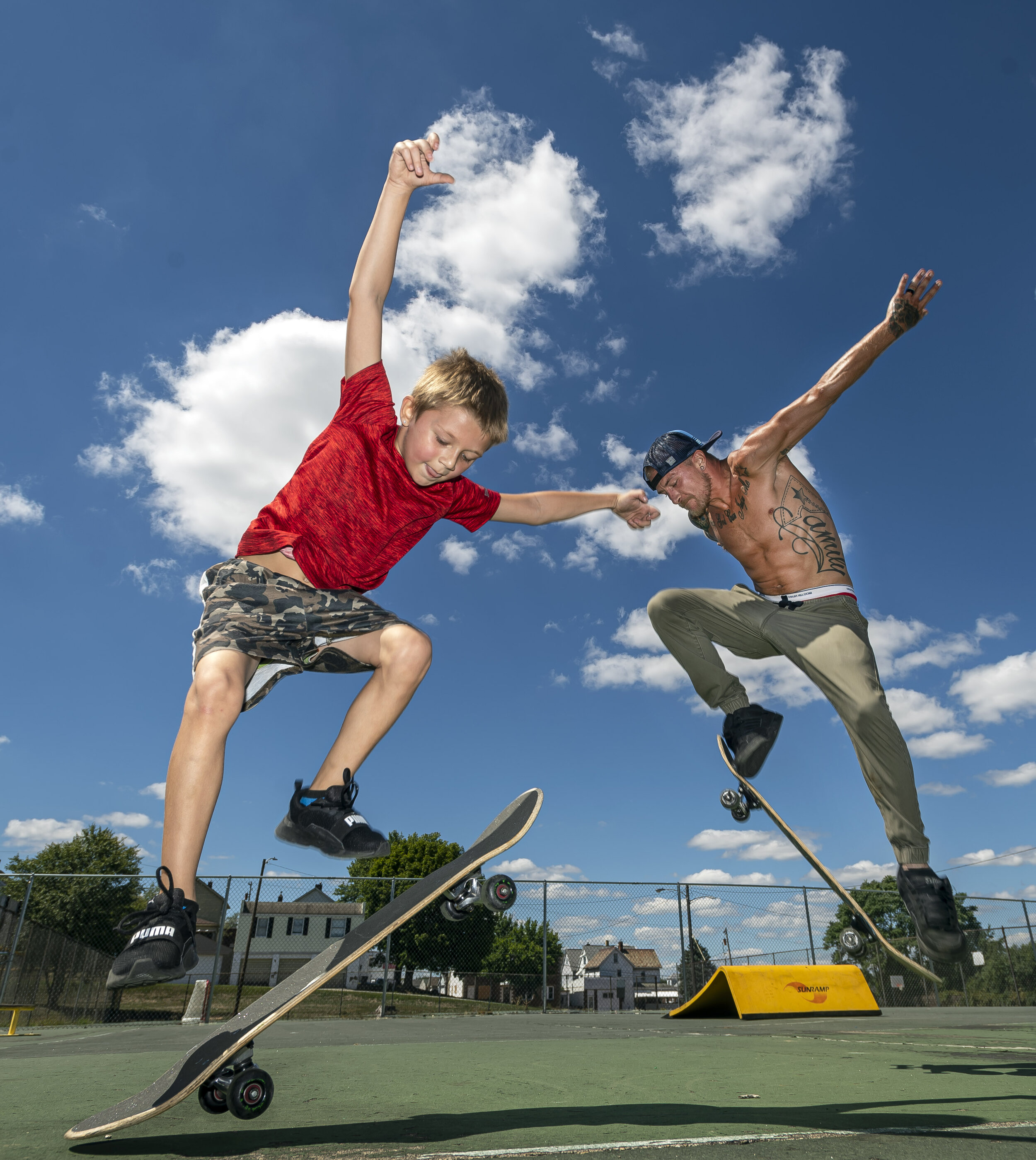  Braydon Drane, 7, practices his ollie trick with his father Colten Drane on Wednesday, Aug. 19, 2020, at Kennedy Park in Vandergrift. "I used to skate with him when he was a baby. Most kids just want to stay inside and play video games...I think it'