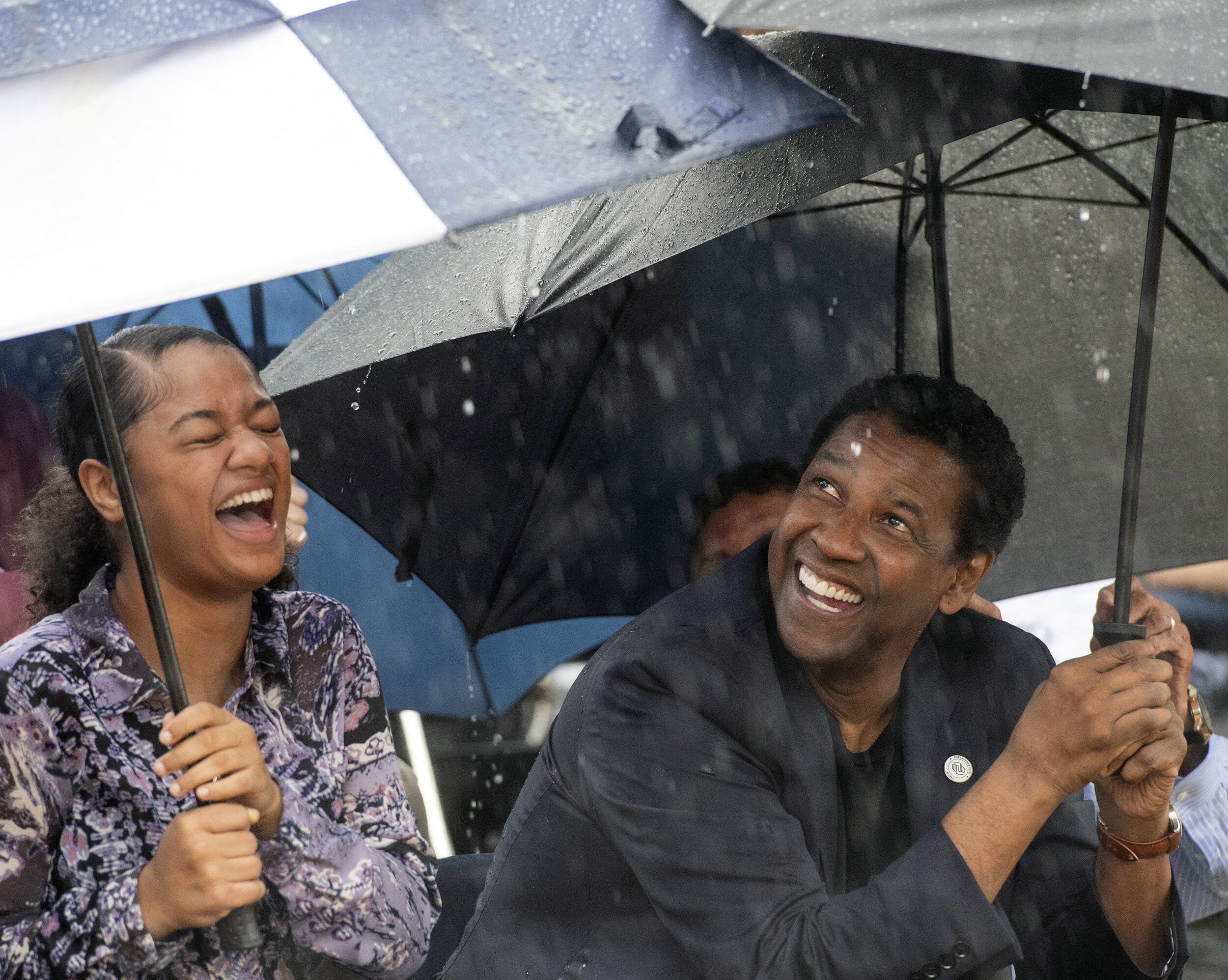  Jamaica Johnson, an 11th-grader at Pittsburgh CAPA, and Denzel Washington share a moment during a "groundblessing" at the August Wilson House on Wednesday,when the actor announced $5 million in support of the projects at the playwright's childhood h
