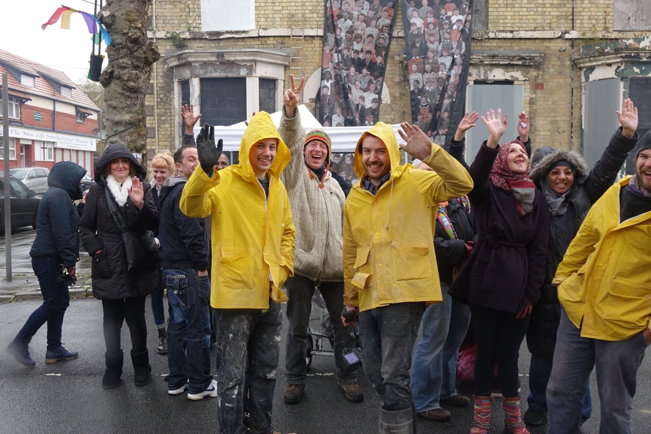 Assemble at Granby 4 Streets Market, in yellow jackets.