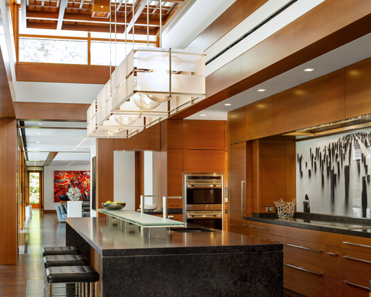 A closer look at the kitchen. The wood is old growth Douglas fir. Douglas fir is a main element throughout the home.