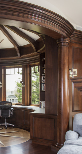 Close-up showing one of the round columns that was shaped exactingly on site by KR+H's master craftsman, Mark Tanis, in order to accurately unite each column with the surrounding millwork.