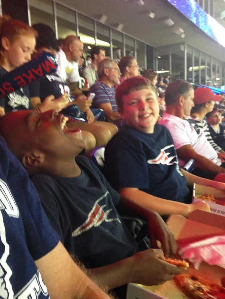 Zaire and Andy's son, Alex, enjoying a game.