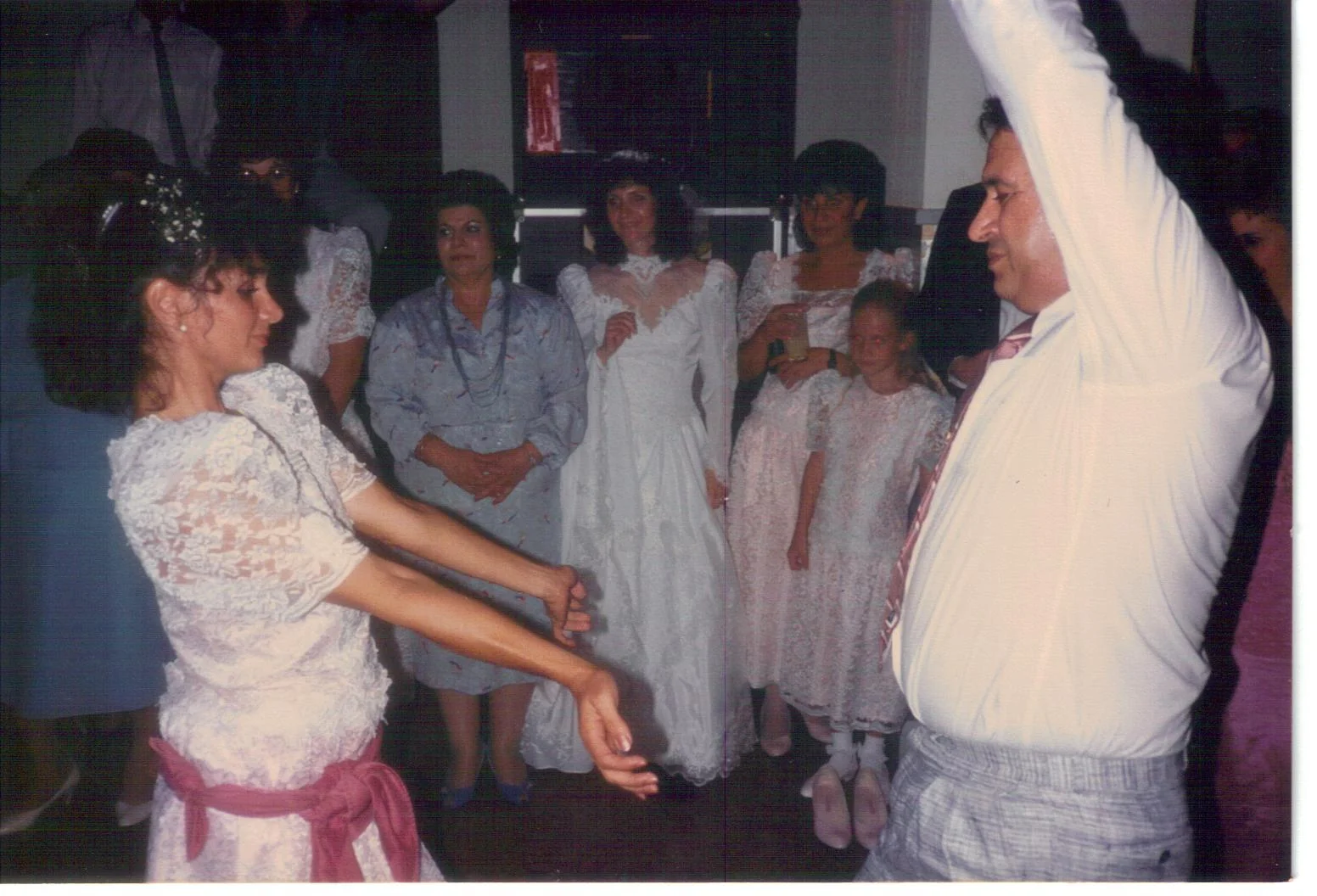 Tarifa (left) and Bobby Farrah (right) dance at a family wedding. Photo courtesy of Tarifa Salem.