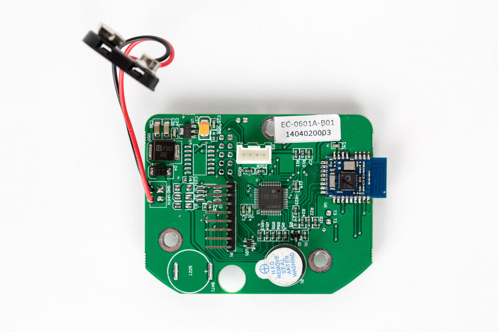 Back side of the entry pad is where the board’s main MCU, a Renesas μPD78F0515A (U1), can be found. It’s accompanied with an NXP QN902X SoC (U6) for BLE communication. Peripherals, such as the 8-pin keypad header (P1) and 4-pin serial interface (P3;…