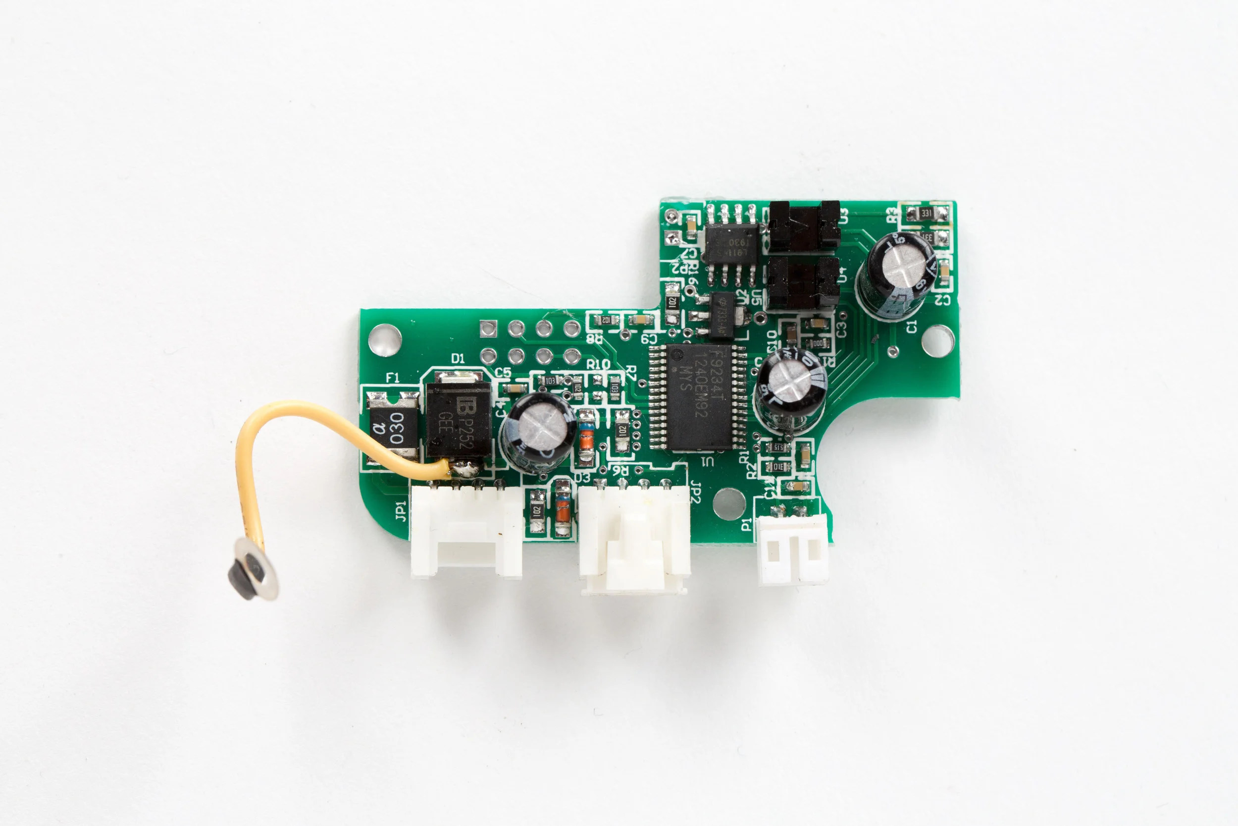 Front side of the lock body circuit board uses a less featureful Renesas μPD78F9234 MCU (U1). It is only known to communicate with a entry pad over the wired 4-pin serial communication interface (JP1), but there is another serial interface (JP2) adjacent to it that is hidden by the lock body cover. Additionally hidden is a 2-pin connector (P1) that is tied to pin 14 on the MCU. Its purpose is still undetermined.