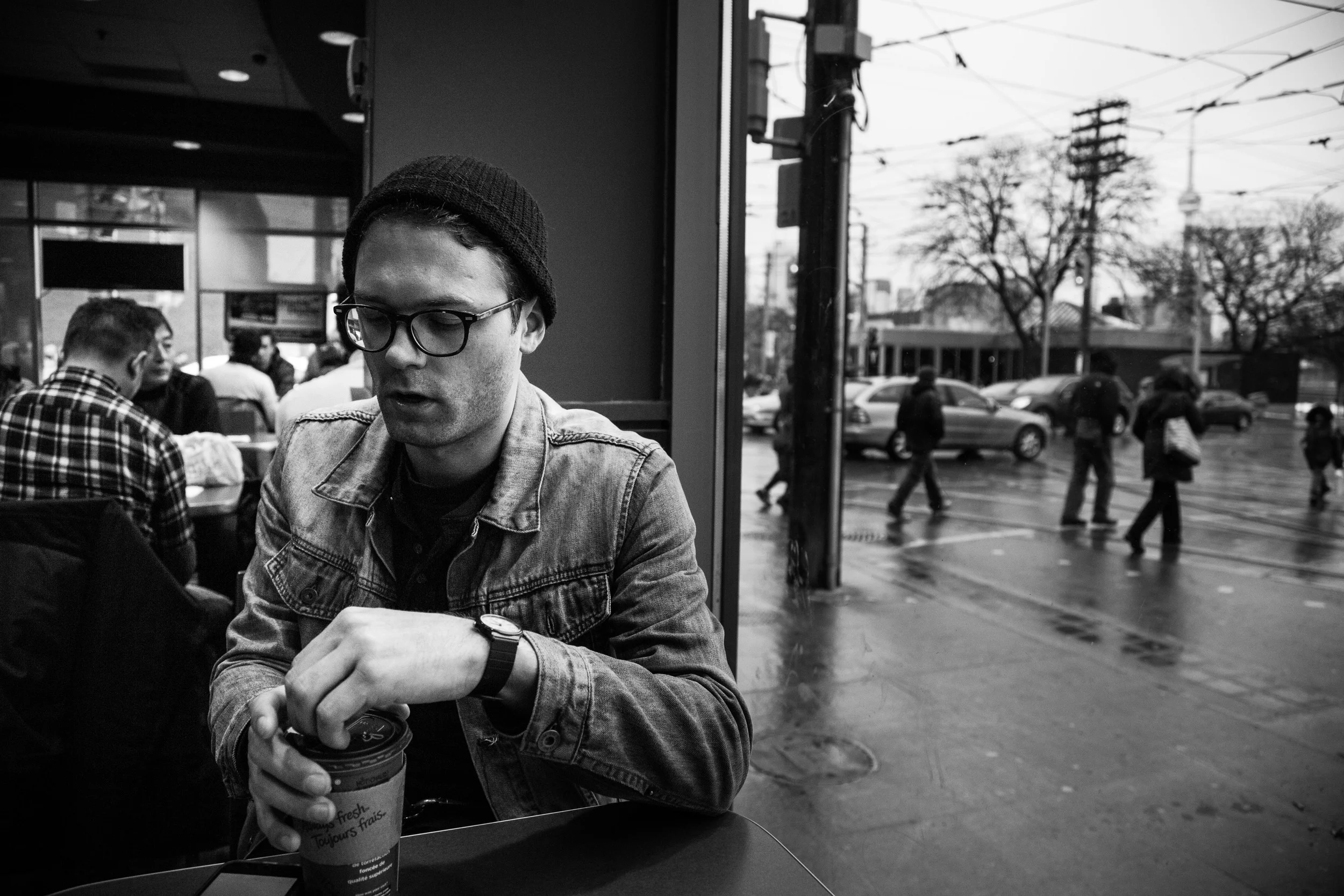 Loren Shumaker sits in a Tim Hortons down the street from the venue in Toronto, Ontario, Wednesday April 6, 2016. Long time fan and photographer Rafael Santos also joined us for a coffee.
