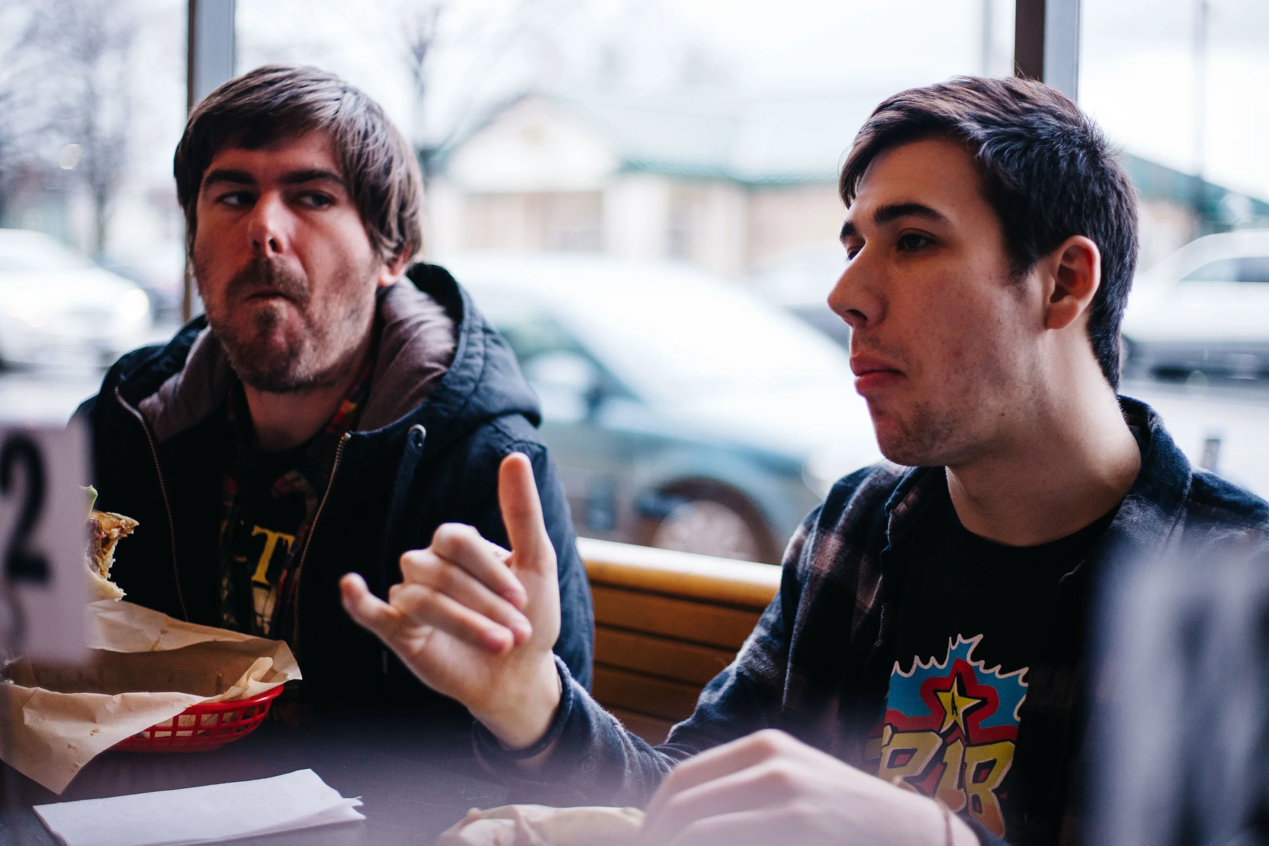 Michael "Fitzy" Fitzgerald and Max Stern eat some dinner before the show at Mahall's in Cleveland, Ohio, Thursday, April 7, 2016.
