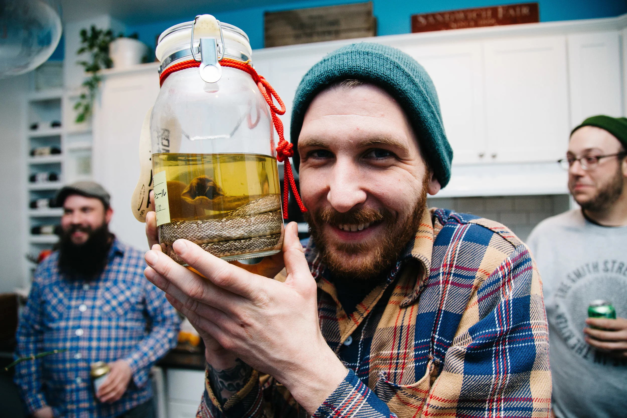 Steve holds a jar of Habushu (viper sake) in Chicago, Illi nois, Sunday, April 10, 2016.