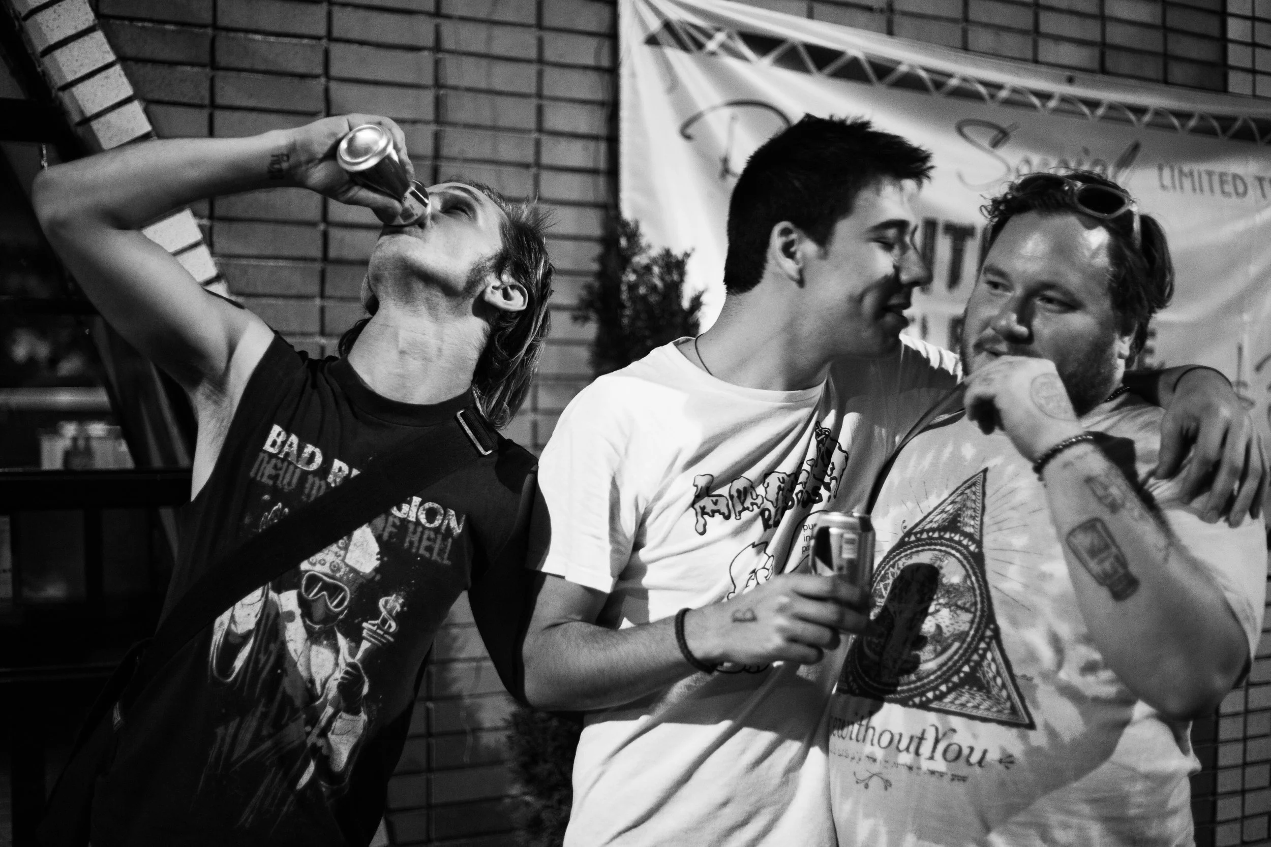 The band celebrated with friends after the show at a local bar. Josh (left), Max (center) and Christopher Diehm of Thin Lips (Right).