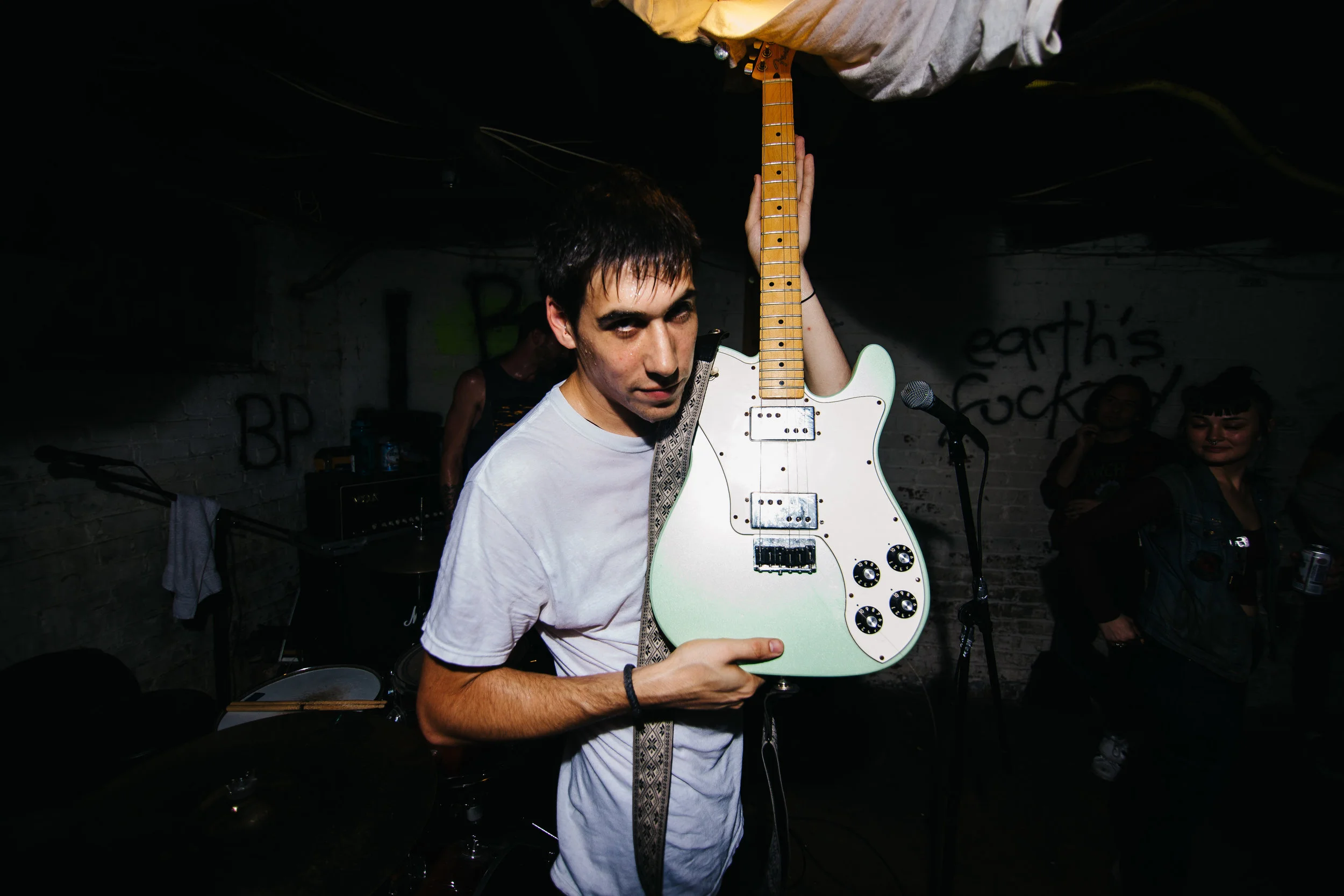 Max broke two strings during their last song, "St. Vincent Charity" in Richmond, Virginia, September 26, 2016.