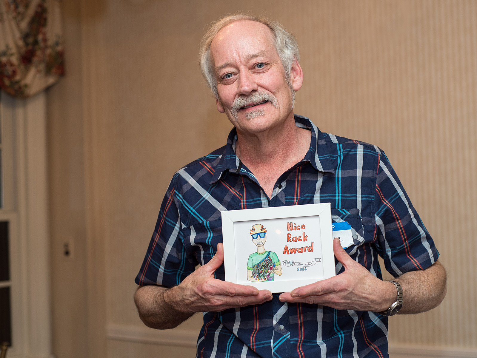 Steve NIchols showing off his "Nice Rack" award