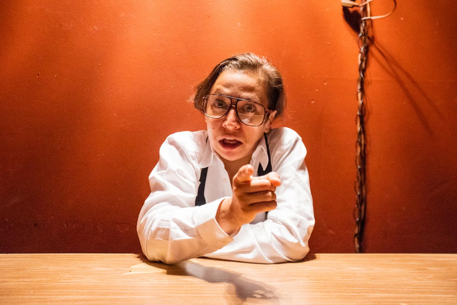 Jackie Rivera as Larry King in Tiny Errors at the End of the Millennium at IRT Theater. Photo by Al Foote III.