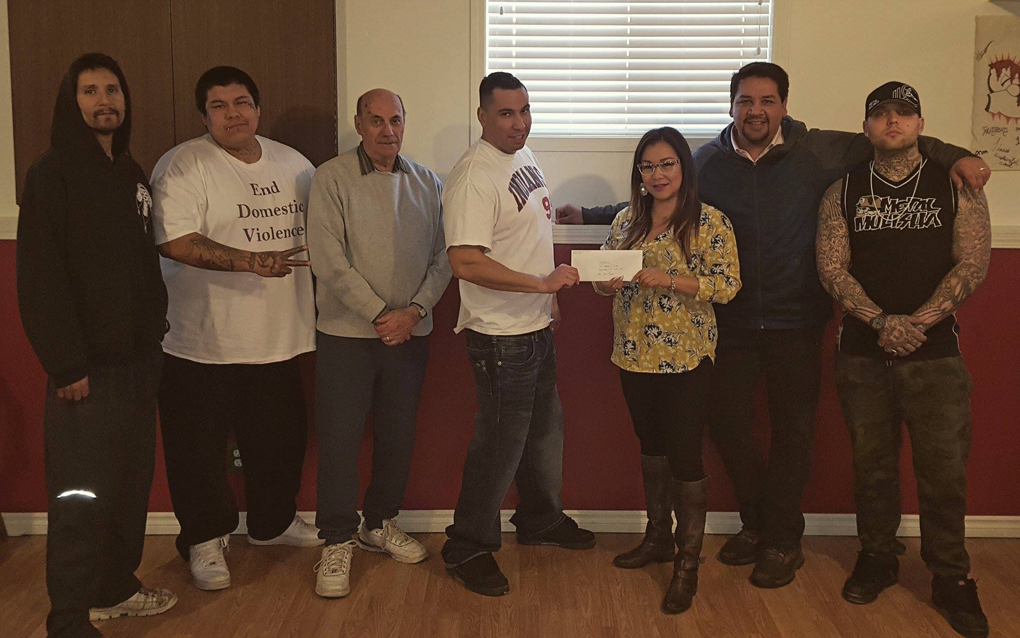 ASWFF's contribution of $25,000 was received by Str8-Up members Dale Isaac, Chris Moyah, Father Andre, Dave Stephenson, Tara Worme, Alex Munoz and Brad Christianson. Picture taken by Shane Taysup.