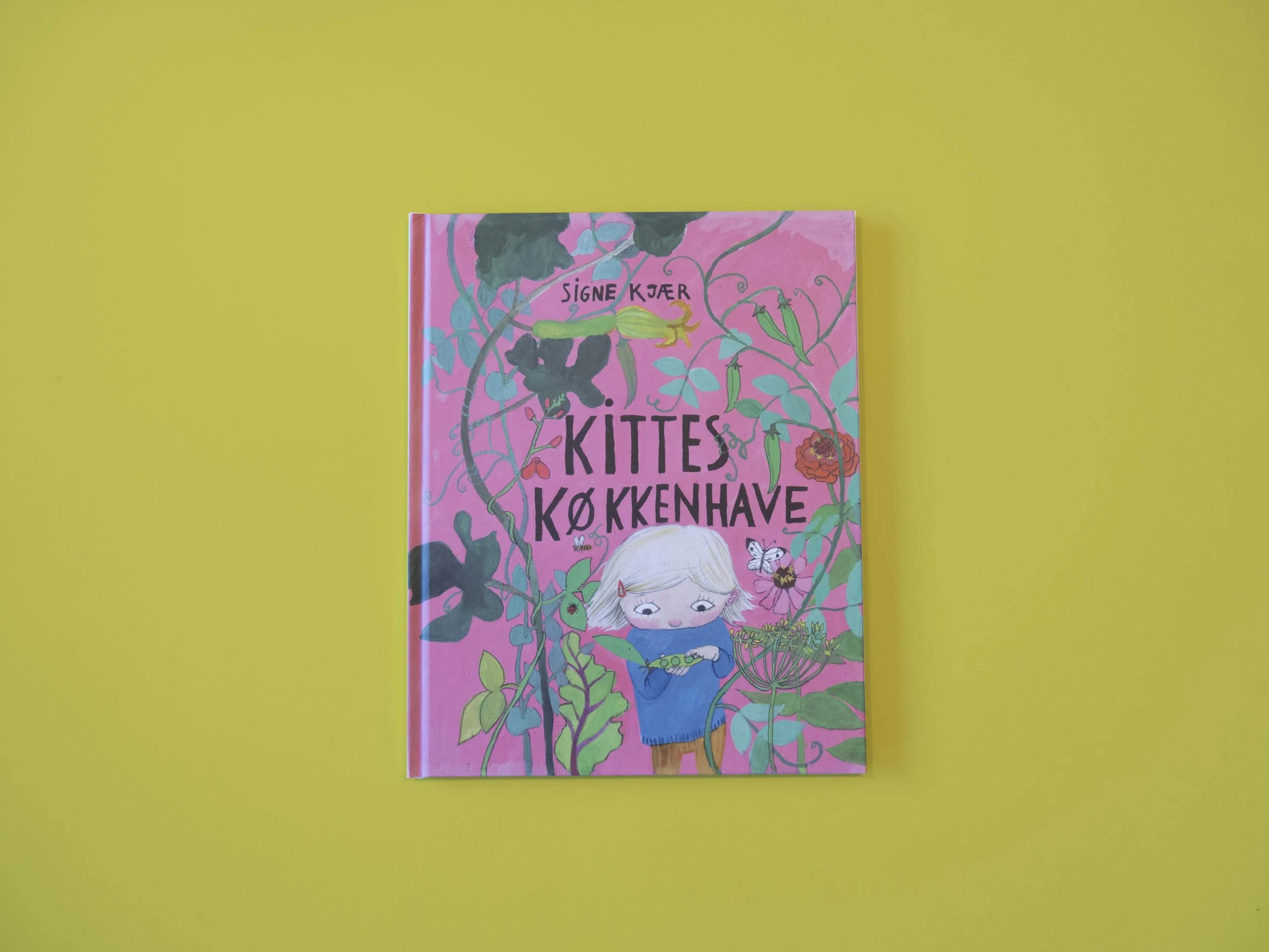   Kittes Køkkenhave   Published in 2017 by  Alvilda   Picture book about Kitte and her vegetable garden. 