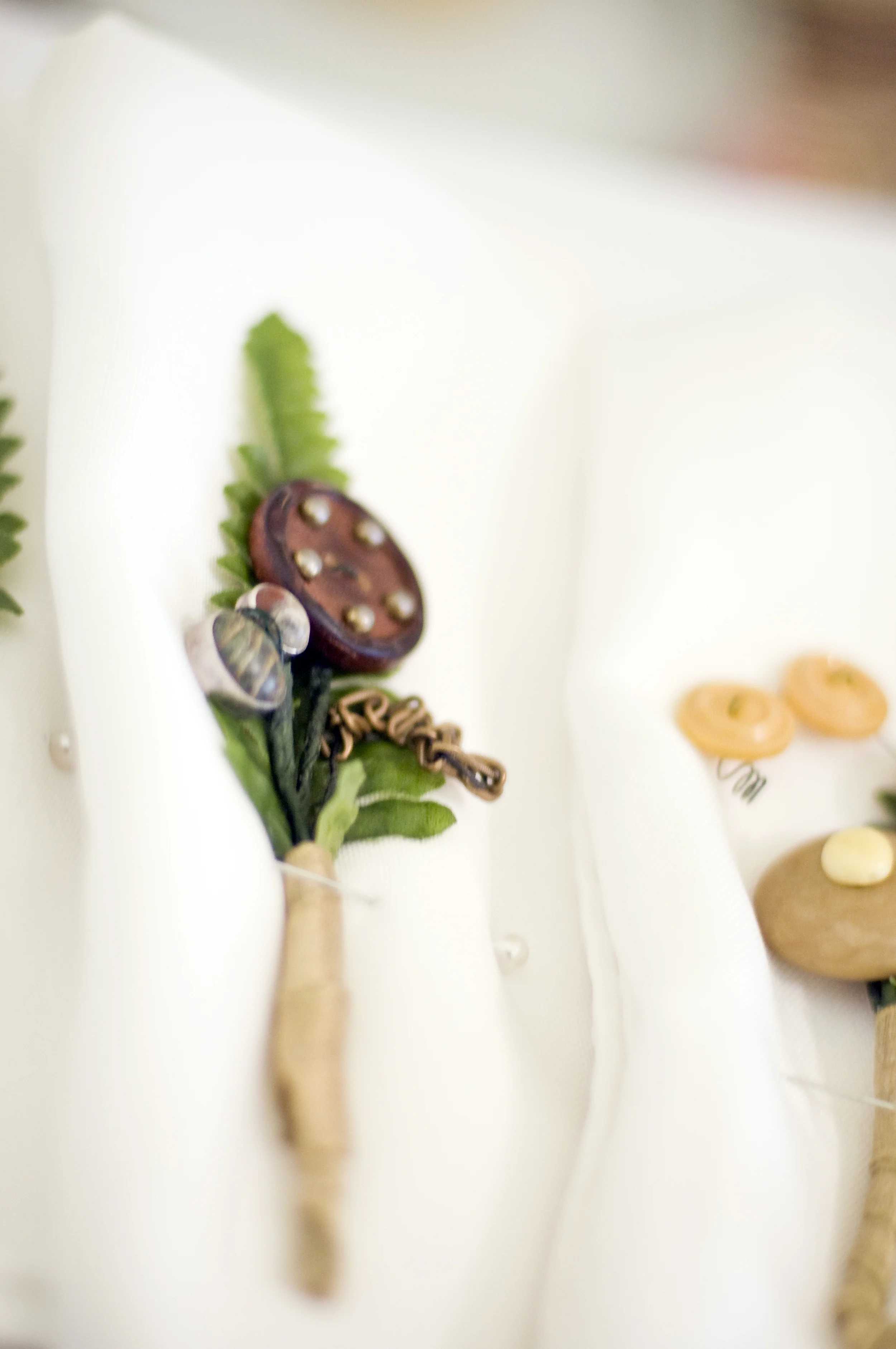 antique button boutonniere.jpg