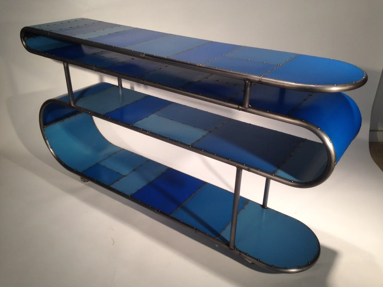 Serpentine console, $2400