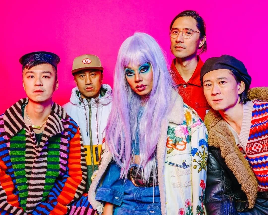 Stevie Huynh in CG contained charm necklace with his Bubble T family in New York Magazine The Cut